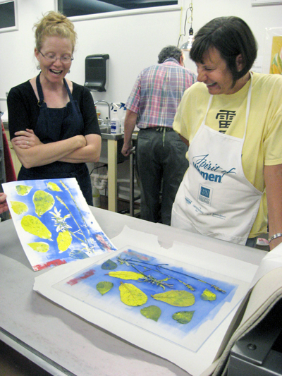 Donna Jacobs and Harriet compare the plate and the monotype print